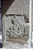 Angkor Wat temple, the crossing cloister, on the pillar-base ascetics in prayer 